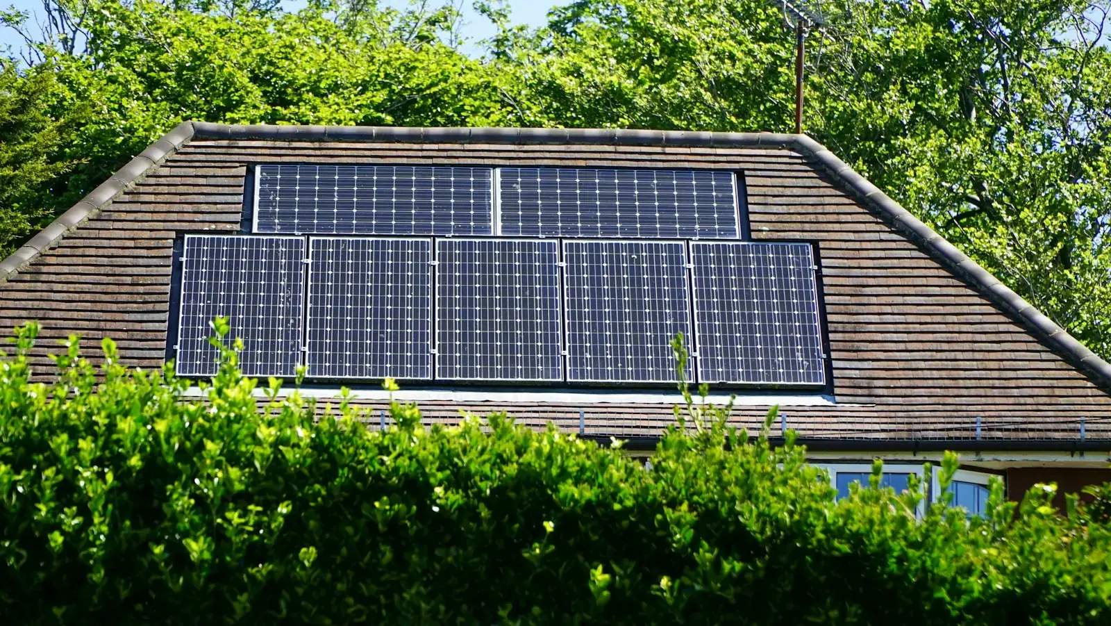 Solar panels on the tiled roof of a home